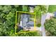 Aerial view of house with pool and lanai in fenced in yard at 96 Hollow Branch Xing, Ormond Beach, FL 32174