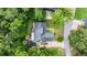 Aerial view of house with pool and lanai at 96 Hollow Branch Xing, Ormond Beach, FL 32174