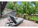 Inviting back deck with chaise lounges, screened lanai and natural landscaping at 96 Hollow Branch Xing, Ormond Beach, FL 32174