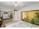 Bedroom with mirrored closet doors and Asian-style folding screen at 96 Hollow Branch Xing, Ormond Beach, FL 32174
