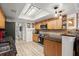 Well-lit kitchen featuring wood cabinets, granite countertops, stainless steel appliances, and recessed lighting at 96 Hollow Branch Xing, Ormond Beach, FL 32174