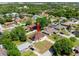 Birds eye view of a cozy home with a large yard and mature trees in a quiet neighborhood at 2600 Scottville Ave, Deltona, FL 32725