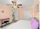 Cozy bedroom with a bright aesthetic, plush bedding, and plenty of natural light at 2600 Scottville Ave, Deltona, FL 32725