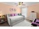 Bright bedroom featuring a daybed, soft colors, and decorative accents at 2600 Scottville Ave, Deltona, FL 32725