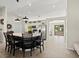 Spacious kitchen features a large island with seating, stainless steel appliances, and modern pendant lighting at 2600 Scottville Ave, Deltona, FL 32725