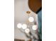 Close up of dining room's mid-century modern chandelier at 10 Madera Rd, Debary, FL 32713