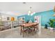 Open floor plan with modern chandelier over dining room at 10 Madera Rd, Debary, FL 32713