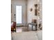 Stylish entryway with a bench, coat hooks, and modern decor accents at 10 Madera Rd, Debary, FL 32713