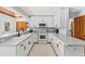 Bright white kitchen with modern appliances and countertops at 10 Madera Rd, Debary, FL 32713