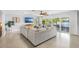 Comfortable living room with a view of the backyard and screened-in porch at 10 Madera Rd, Debary, FL 32713