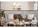 Comfortable seating featuring throw blanket and decorative pillows at 10 Madera Rd, Debary, FL 32713