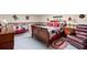 Inviting bedroom featuring classic decor, complemented by cozy bedding, wood furnishings and decorative accents at 1056 Reynolds Rd, De Leon Springs, FL 32130