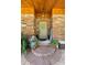 Charming front entrance with decorative wreath and flower pots at 1056 Reynolds Rd, De Leon Springs, FL 32130