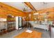 Charming tasting room featuring rustic wood paneling, display shelves, and quaint decor at 1056 Reynolds Rd, De Leon Springs, FL 32130