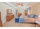 Spacious bedroom features a trey ceiling, ceiling fan, and an abundance of storage at 110 No Name Key Dr, Deland, FL 32720