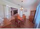 Dining room with hardwood floors and classic decor, creating a warm and inviting space for gatherings at 110 No Name Key Dr, Deland, FL 32720