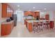 Spacious kitchen featuring a large center island, granite countertops, and ample cabinet space at 110 No Name Key Dr, Deland, FL 32720