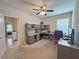 Well-organized home office with a large desk and plenty of storage, perfect for remote work and creative projects at 110 No Name Key Dr, Deland, FL 32720