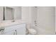 Bright bathroom featuring a modern vanity, toilet, and shower-tub combo at 112 Lost Ball Dr, Daytona Beach, FL 32124