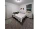 Comfortable bedroom with carpet flooring, sliding closet doors, and a bright window with blinds at 112 Lost Ball Dr, Daytona Beach, FL 32124