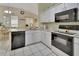 Functional kitchen features modern appliances and white cabinets, ready for culinary adventures at 1125 Stillwater Dr, Deland, FL 32720