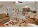 Open-concept living area showcases tile flooring, neutral decor, and comfortable seating at 1125 Stillwater Dr, Deland, FL 32720