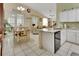 Bright and open living space connecting kitchen, dining, and living areas for easy flow at 1125 Stillwater Dr, Deland, FL 32720