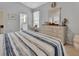 Relaxing main bedroom with adjacent bathroom and ample natural light at 1125 Stillwater Dr, Deland, FL 32720