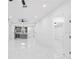 The open-concept living room flows into the kitchen and features modern design elements and abundant natural light throughout at 1163 W Hancock Dr, Deltona, FL 32725