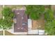 Aerial view of home showcasing the roof, driveway, and backyard layout with various structures at 1204 Lawrence Ave, Deltona, FL 32725