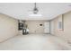 Spacious garage featuring utility sink and water heater, offering ample storage and functionality at 1204 Lawrence Ave, Deltona, FL 32725