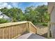 Newly built wooden back porch overlooking green back yard at 1226 North St, Daytona Beach, FL 32114