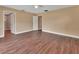 Bedroom features wood floors, ceiling fan and neutral paint with doors to bathroom and hallway at 1226 North St, Daytona Beach, FL 32114