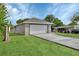 This home boasts a spacious two-car garage and well-maintained lawn at 1226 North St, Daytona Beach, FL 32114