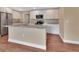 Beautiful kitchen with white cabinets, granite countertops and stainless steel appliances at 1226 North St, Daytona Beach, FL 32114