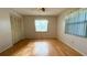 Bright bedroom with a window offering natural light and a closet for ample storage space at 1301 Killian St, Daytona Beach, FL 32114