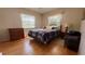 Inviting bedroom with a hardwood floor and natural light, ideal for restful nights at 1301 Killian St, Daytona Beach, FL 32114