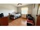 Comfortable bedroom with hardwood floors, a single bed, and plenty of natural light at 1301 Killian St, Daytona Beach, FL 32114