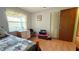 Comfortable bedroom with a window providing natural light, closet and three-drawer dresser at 1301 Killian St, Daytona Beach, FL 32114