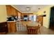 Cozy kitchen with wooden cabinetry, a breakfast nook, and modern appliances at 1301 Killian St, Daytona Beach, FL 32114