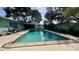 Refreshing pool perfect for relaxation surrounded by well-maintained patio and lush greenery at 1301 Killian St, Daytona Beach, FL 32114