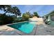 Refreshing pool perfect for relaxation surrounded by well-maintained patio and lush greenery at 1301 Killian St, Daytona Beach, FL 32114
