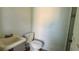 Toilet room with basic fixtures; offers potential for renovation and customization at 1301 Killian St, Daytona Beach, FL 32114