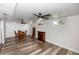 Finished basement with wood-look floors, a fireplace, and bonus seating at 136 W Gardenia Dr, Orange City, FL 32763