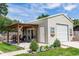 Newly built metal structure with outdoor seating and a well-manicured lawn at 136 W Gardenia Dr, Orange City, FL 32763