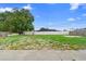 A backyard with a white fence at 1483 Meadowlark Dr, Deltona, FL 32725
