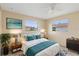 Bright bedroom with a large bed, colorful décor, and multiple windows providing plenty of natural light at 1483 Meadowlark Dr, Deltona, FL 32725