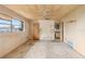 View of the bedroom with a window, ceiling fan, and doorway to the kitchen at 1483 Meadowlark Dr, Deltona, FL 32725