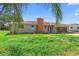 Exterior view of the home showing the front elevation at 1483 Meadowlark Dr, Deltona, FL 32725