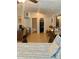 Bright bedroom featuring tile floors, ceiling fan, closet and natural light at 1485 Gainsville Dr, Deltona, FL 32725